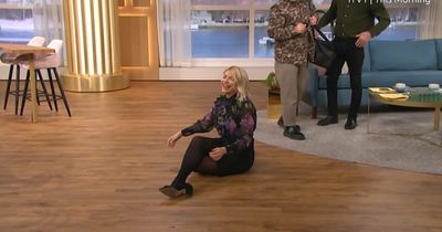Holly Willoughby falls over on ITV This Morning as she recreates scenes from Alison Hammond's birthday party as Phillip Schofield skips bash
