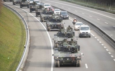 Analysis-Swiss neutrality on the line as arms-for-Ukraine debate heats up