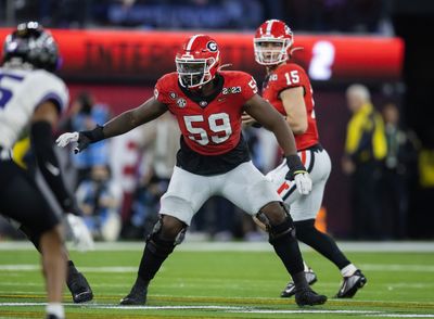 PFF has the Titans selecting another Georgia OT in Round 1