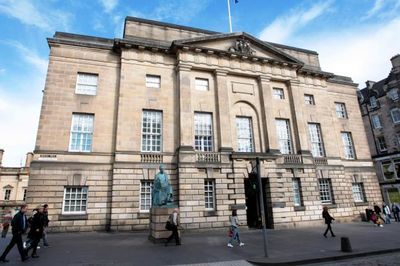 Scottish police officer 'raped woman and pushed her down stairs', court told