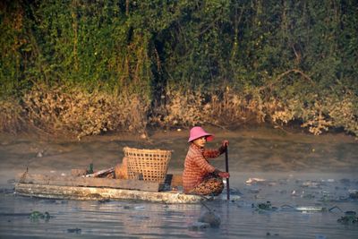 On the water with Myanmar's 'river cleaners'