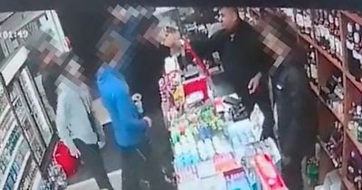 CCTV captures brazen shop worker lighting up a cigarette for underage customer