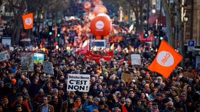 French unions remain defiant in face of proposed pension reform despite dip in protester numbers