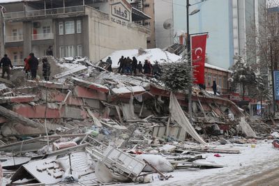 Families beg for help to find loved ones in snow-covered earthquake debris