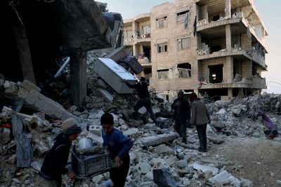 Aid to quake-hit Syria slowed by sanctions, war's divisions