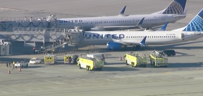 Four taken to hospital after battery catches fire during United flight