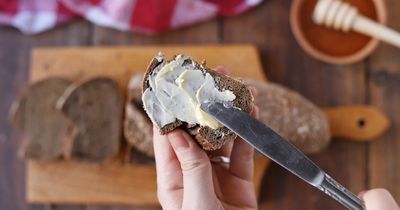 Woman's unique butter spreading hack for bread sparks debate as it 'oozes' out