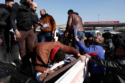 In black body bags, Syrians in Turkey make final journey home