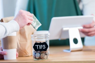 Americans are fed up with tipping—but they’re doing it more often