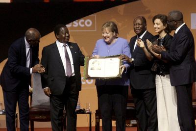 Germany's Merkel receives UNESCO peace prize in Ivory Coast