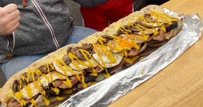 Burger van offers reward to first person able to complete its 2ft long mega sandwich challenge
