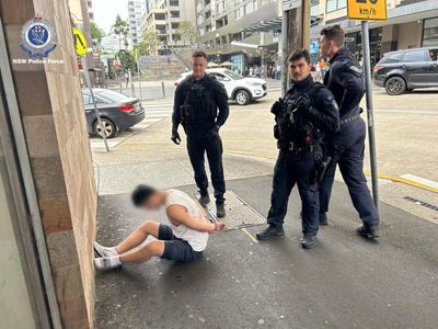 Men charged over 130kg of ice found in bathroom tiles