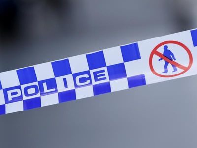Man arrested, gun seized after body found in NSW home