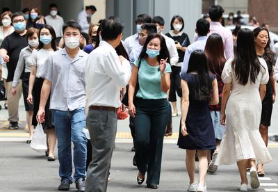 Singapore relaxes COVID travel curbs, mask rules further