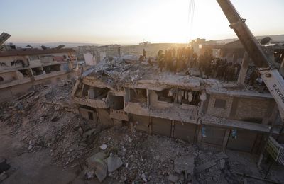 First U.N. quake aid convoy reaches Syria as envoy says needs immense