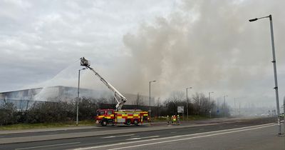 Glasgow fire crews remain at scene of east end recycling centre inferno over 24 hours later