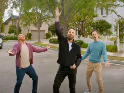 John Travolta spoofs hit ‘Grease’ song in new Super Bowl commercial with Zach Braff and Donald Faison