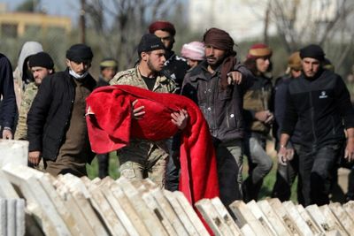 Rescuers race to find Turkey-Syria quake survivors as toll tops 21,000