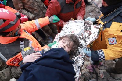 Children rescued from ruins days after earthquake, but death toll tops 23,700