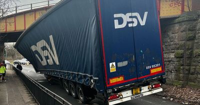 Edinburgh lorry stuck under bridge at busy roundabout sparking huge delays