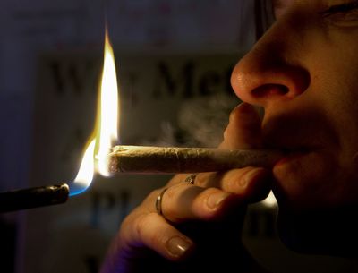 Amsterdam to ban cannabis outdoors in red-light district