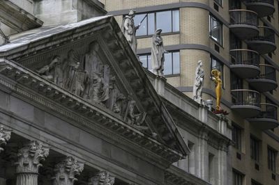 Woman statue finally takes spot beside Moses, Confucius at New York court