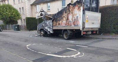 Wreckage of burnt out Edinburgh delivery lorry left on quiet residential street