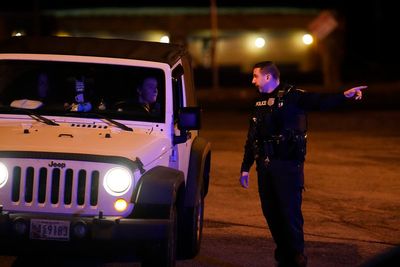 Gunman’s capture ends 39-hour manhunt with 2 officers shot