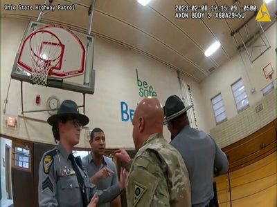 Body-camera shows commander confront reporter before arrest