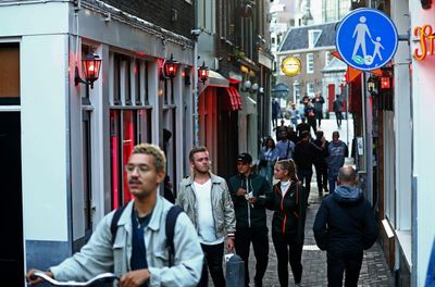 Amsterdam will ban cannabis outdoors in its red-light district