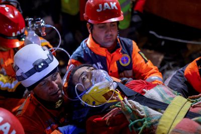 Miracle rescues as quake toll passes 25,000
