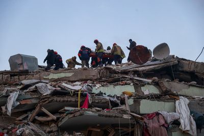 Rescue teams find more survivors of devastating quakes