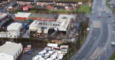 Fire crews remain at Glasgow east end recycling centre four days after blaze as roads reopened