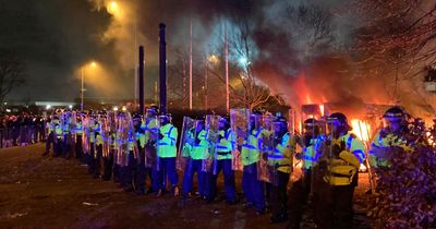 Fifteen arrested as lit fireworks launched at police outside Suites Hotel