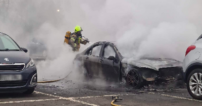 Car erupts in flames in Glasgow Maryhill supermarket car park as firefighters battle blaze