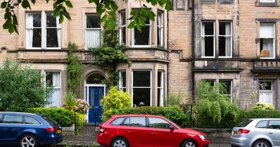 Woman gets £90k revenge on neighbours who parks nine cars outside her house