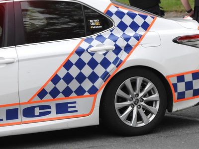 Murder probe after body found in Qld back yard