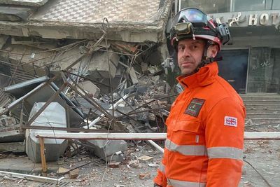 British firefighters film dramatic moment two people rescued from rubble