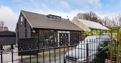 'Gothic bungalow' which is painted entirely black inside and out goes on the market