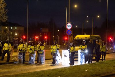 Teenager charged after violent protests outside asylum seeker hotel in Merseyside