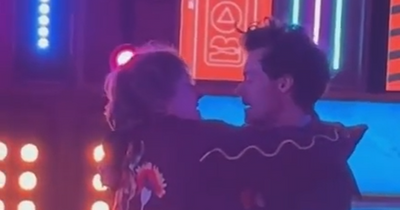 Lewis Capaldi pulls Harry Styles in for a kiss after BRIT Award win