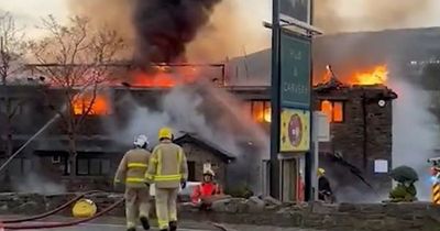 People warned to close windows and doors as landmark pub goes up in flames