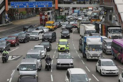 'Lucky' car number plate with letter 'R' sells for HK$25 million at auction in Hong Kong