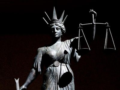 Woman accused of 'drug courier' role in fake $1.1m deal