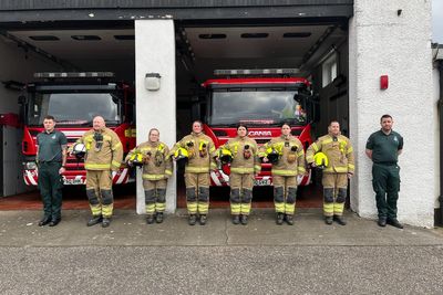 Firefighters hold minute’s silence for Barry Martin who died after Jenners blaze