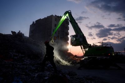 Excavators start removing debris in Turkish region hit by earthquake