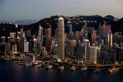 Hong Kong adds security law clauses to land sales, property stocks drop