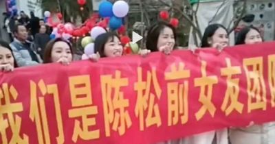 Ex-girlfriends crash wedding with banner threatening to expose groom's past