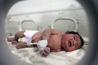Newborn saved from rubble in quake-hit Syria in good health