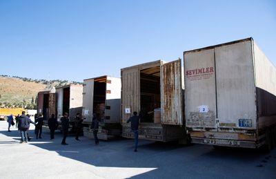First U.N. aid convoy passes into northwest Syria from newly-opened crossing